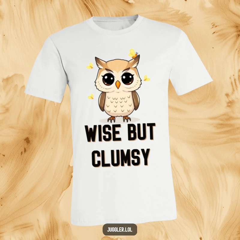 Funny owl t-shirt depicting a determined owl with wide eyes juggling glowing fireflies, perfect for night owls and magic lovers.